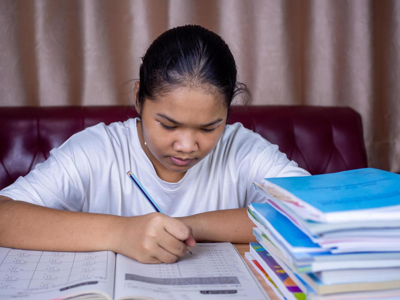 Girl doing homework photo