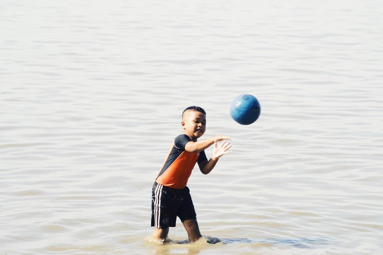 Sorong, Indonesia 2021- People on the beach photo