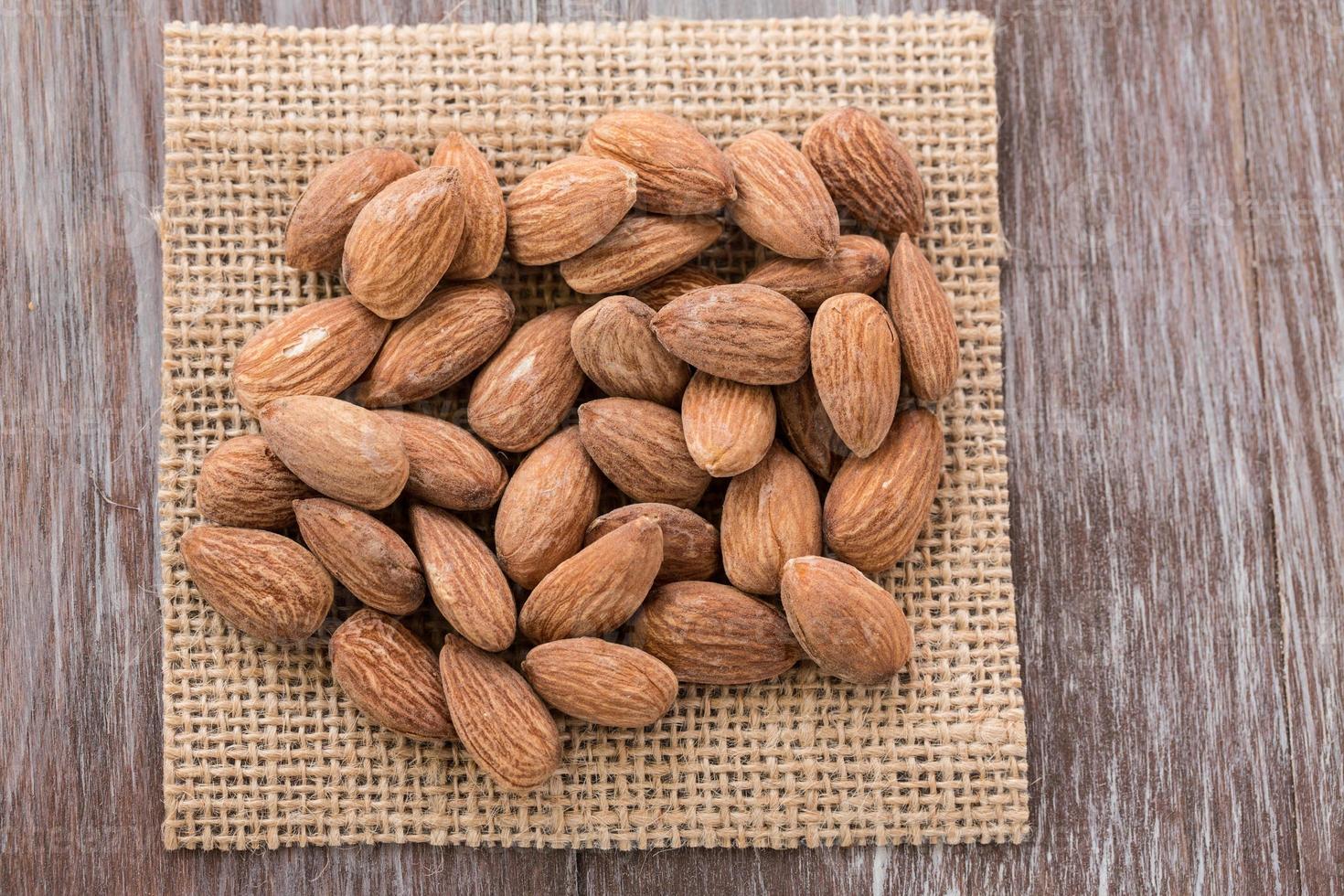 Heap of Almonds on Burlap photo