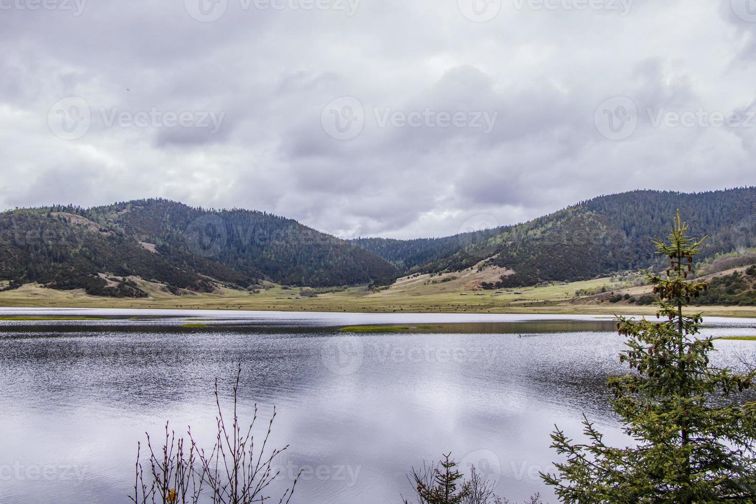 lake in Pudacuo national park in Shangri La, Yunnan Province, China photo