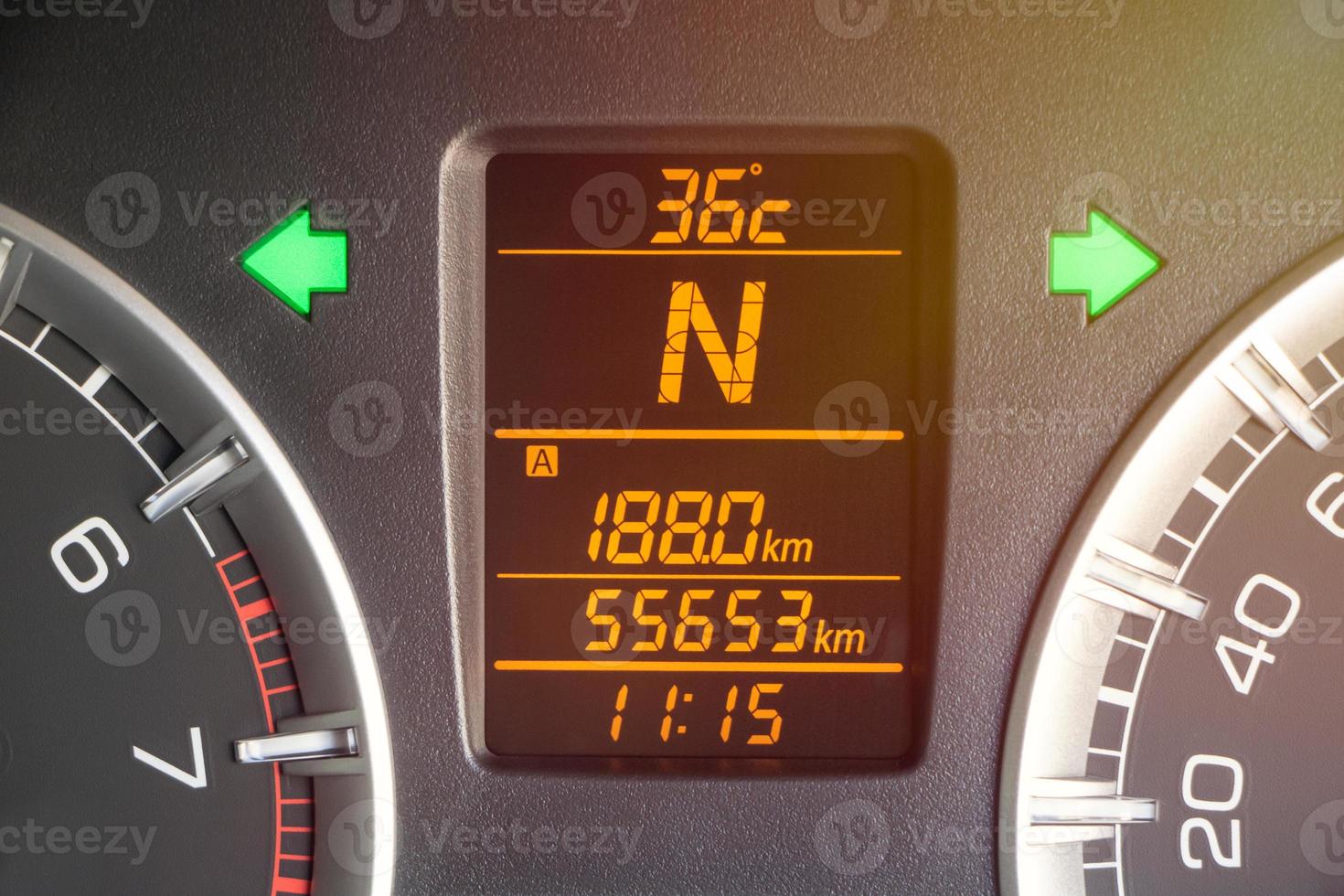 Screen showing distance to drive, gear position, outside temperature photo