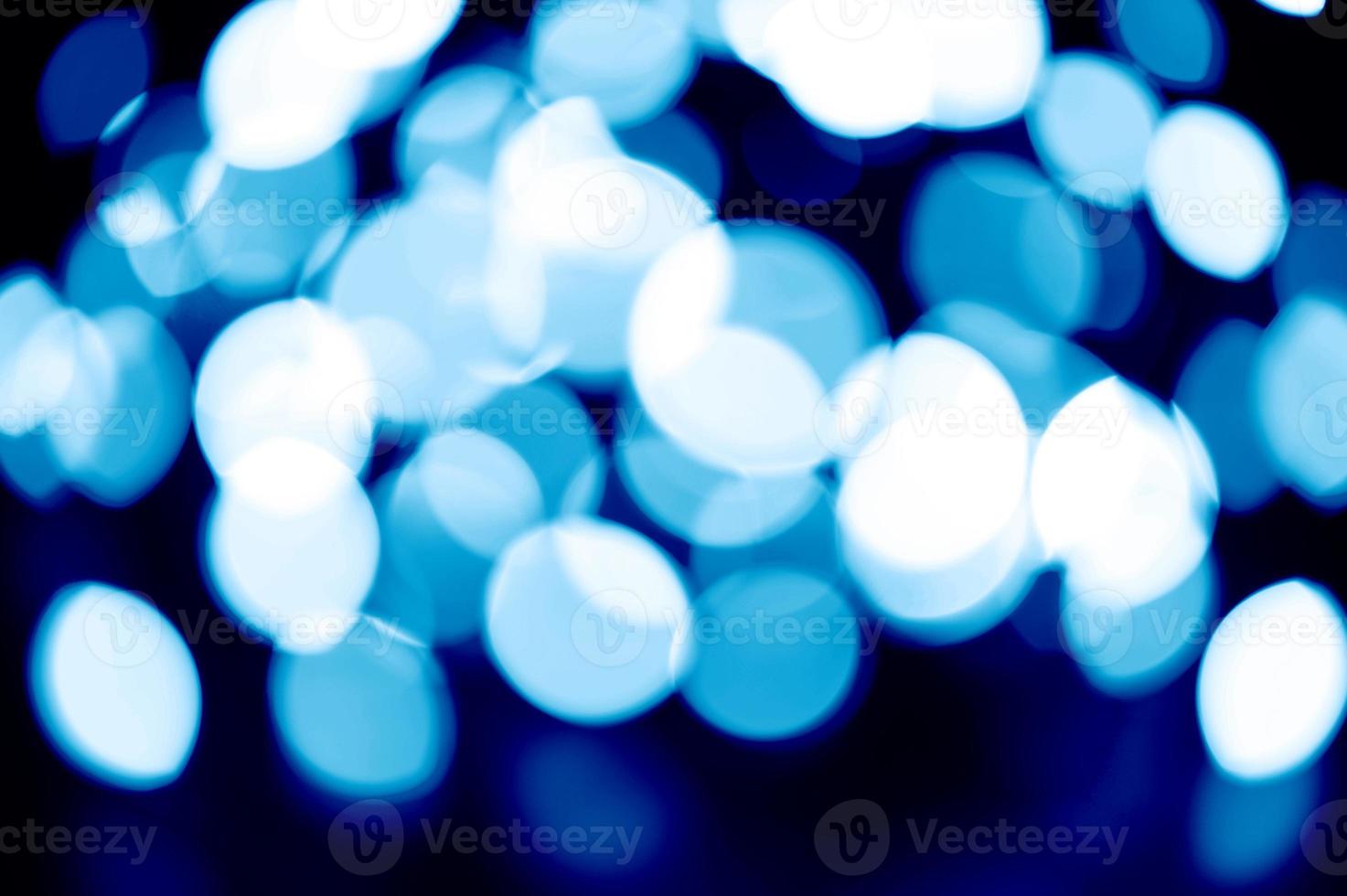 Blue glowing light bokeh photo