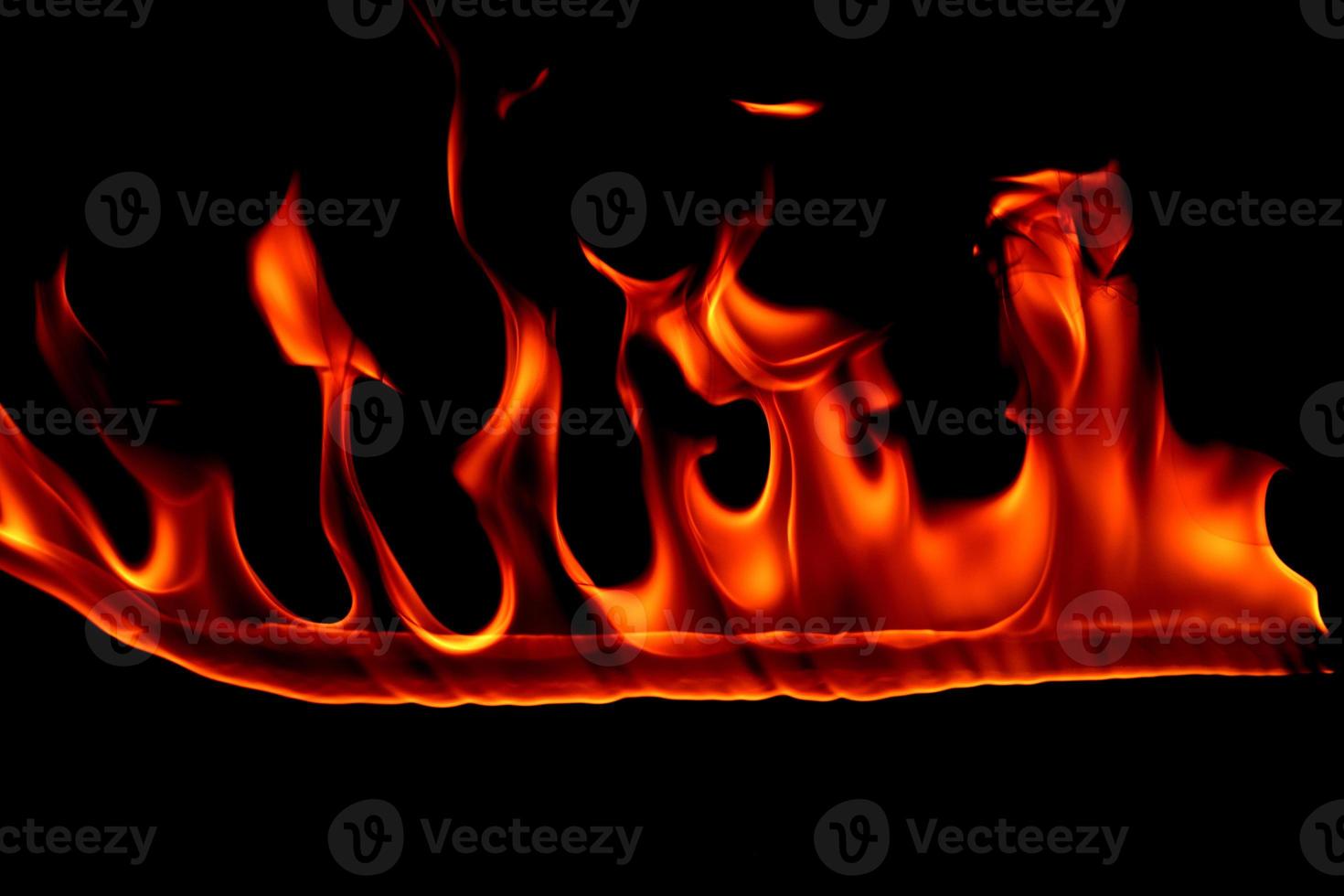 Fire flame on blackground photo