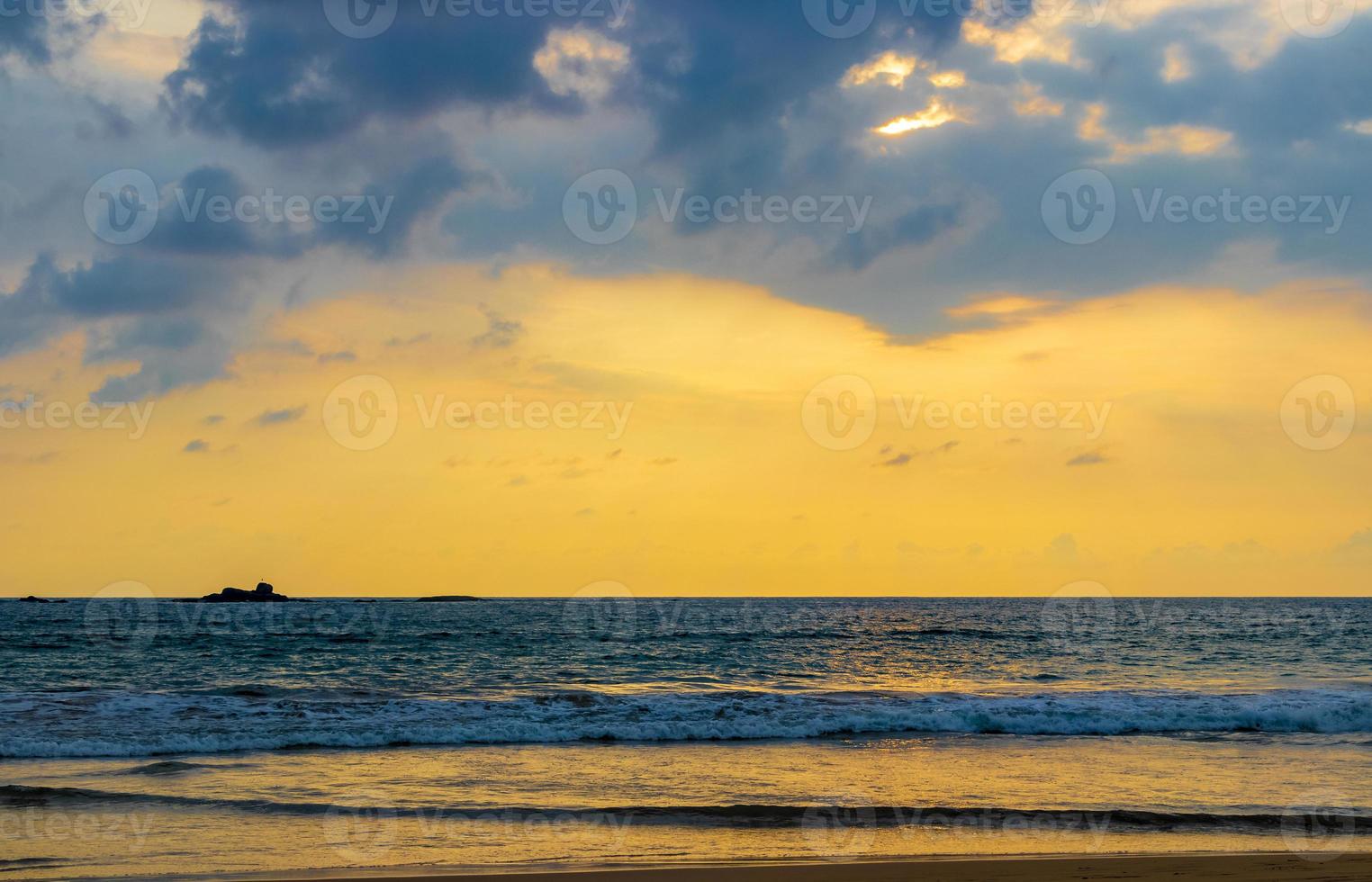 Beautiful colorful sunset landscape panorama Bentota Beach Sri Lanka. photo