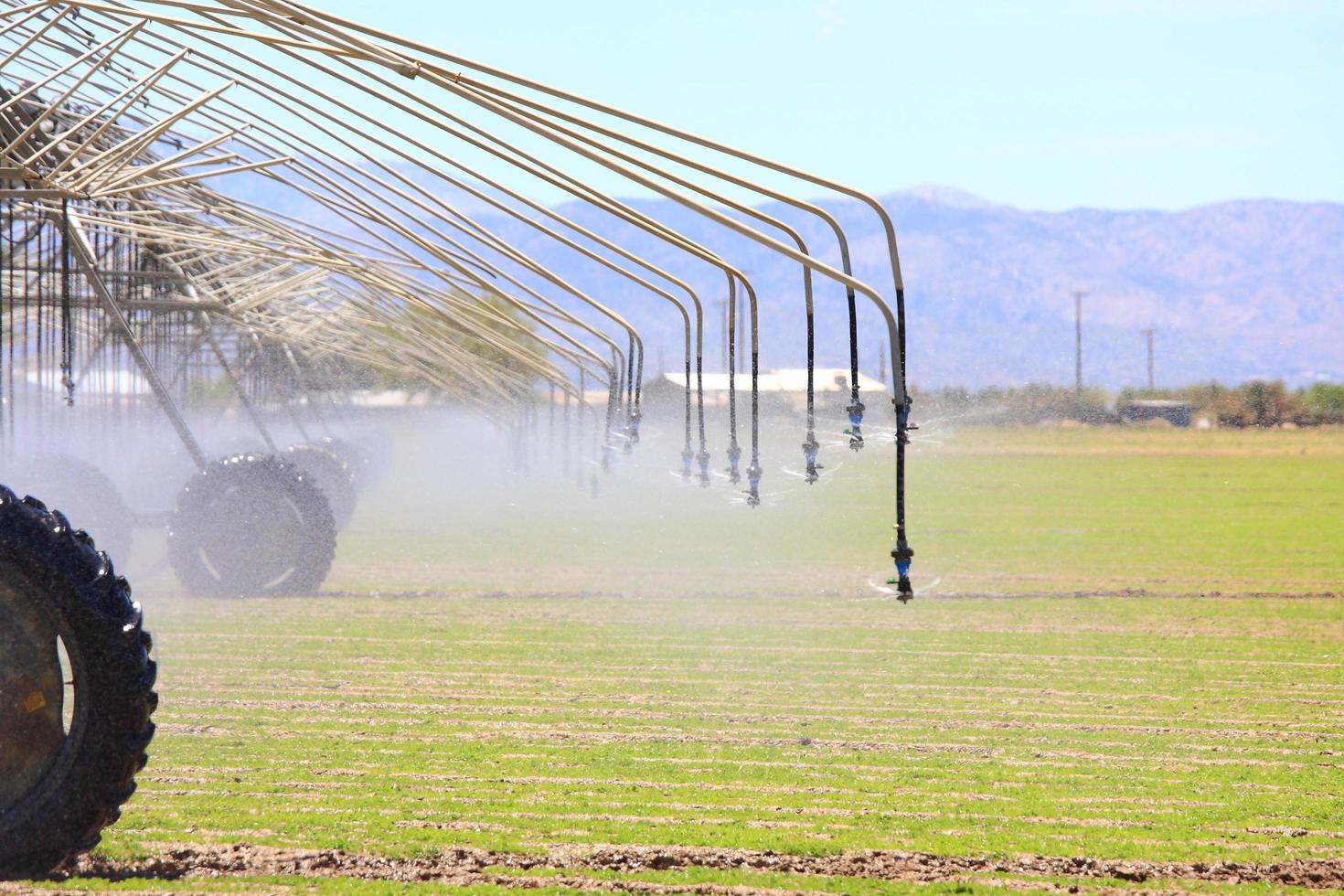 Watering nozzles and mountains in the suburbs of Los Angeles, USA photo
