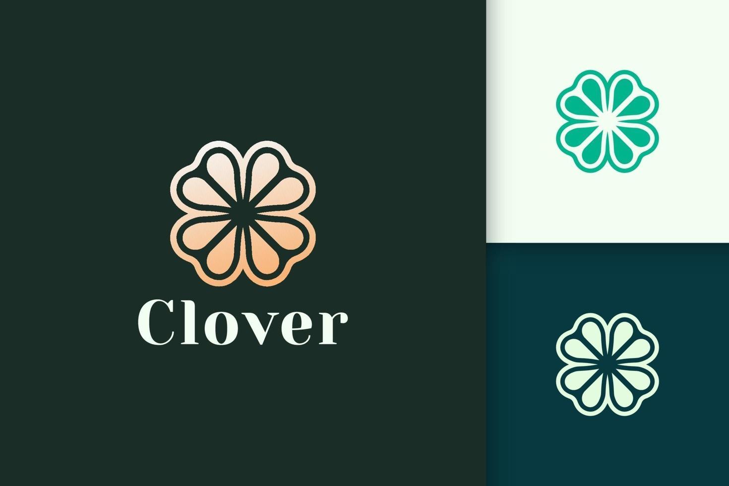 Clover leaf logo in luxury gold color represent lucky or herb vector