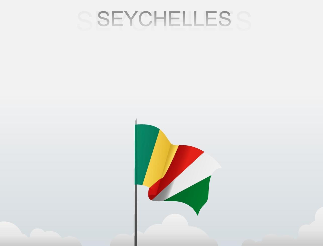 Flag of Seychelles flying under the white sky vector