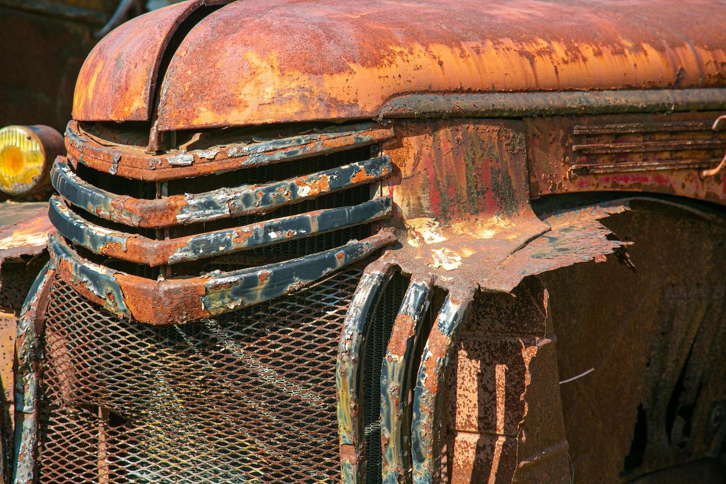 Grill of an old rusty truck photo