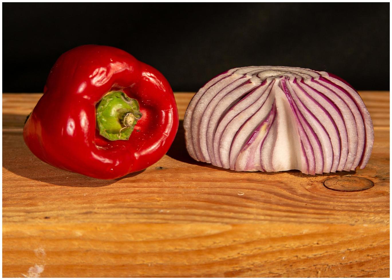 Red pepper and red onion still life photo