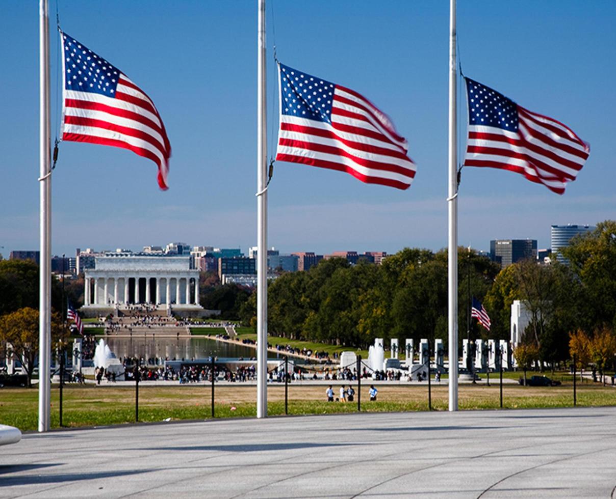 American flags at half staff photo