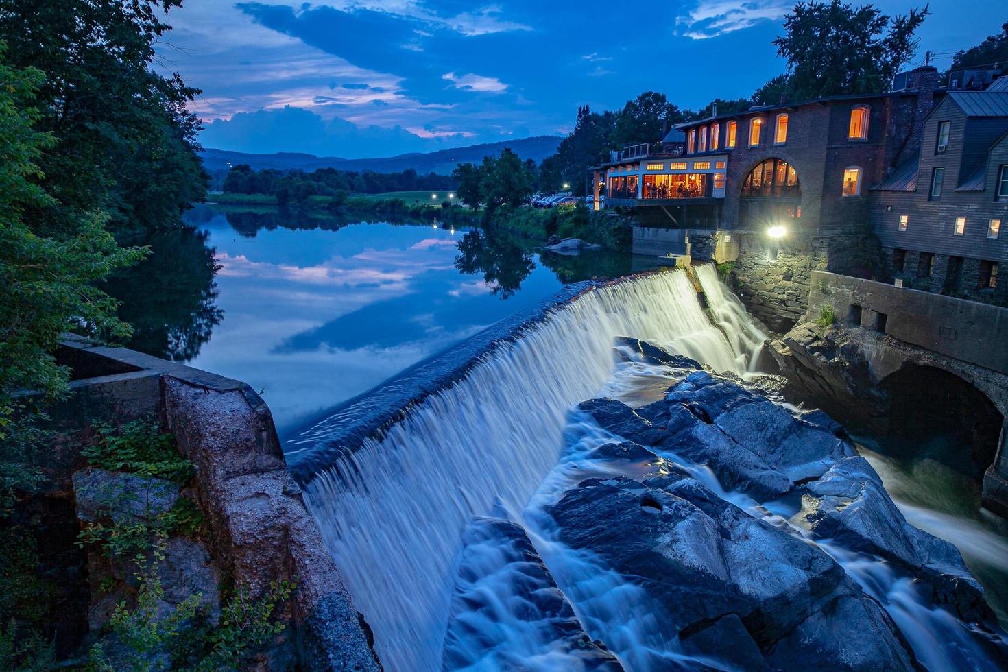 Water over a dam in Woodstock Vermont photo