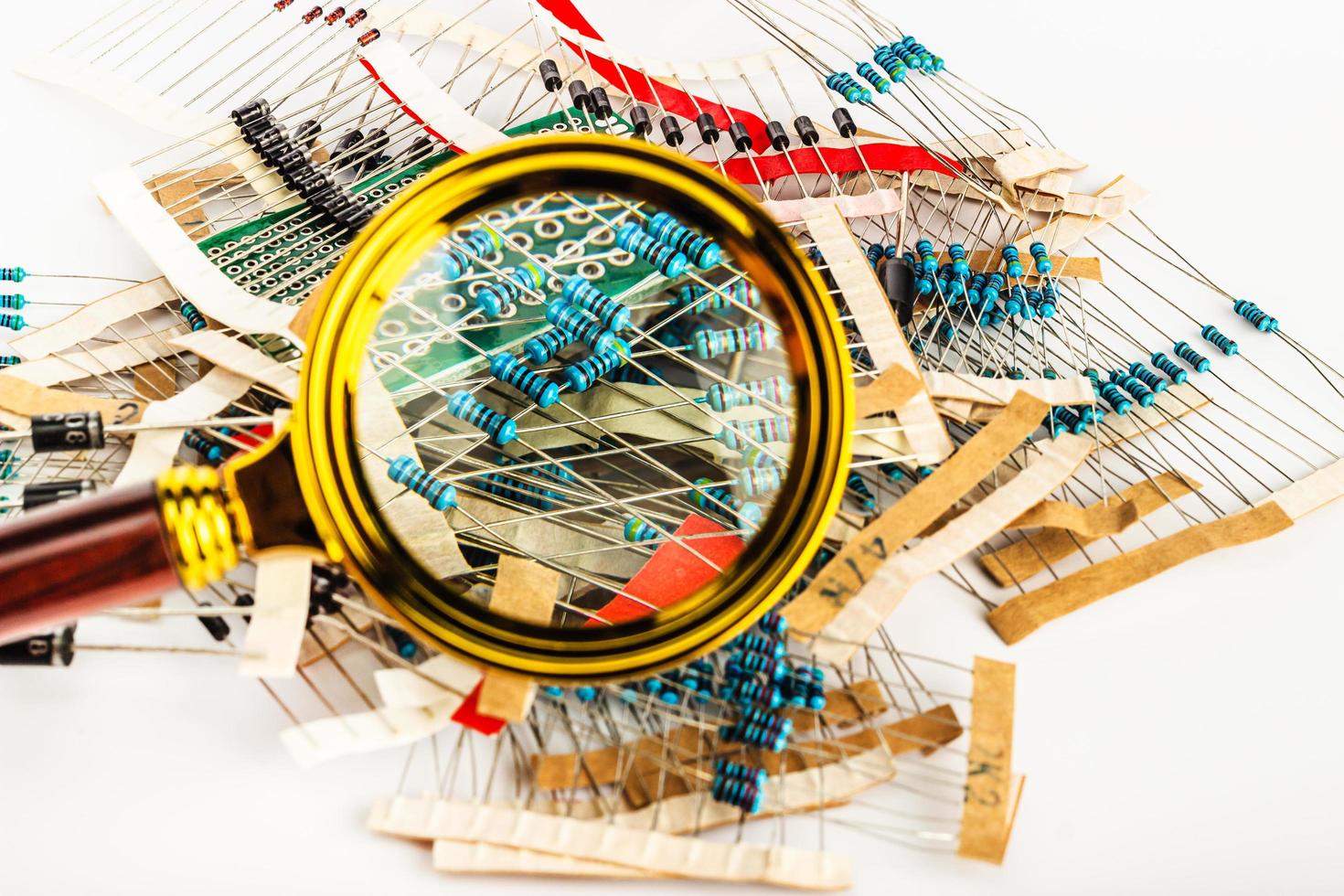 Electronic components, resistors under a magnifying glass photo