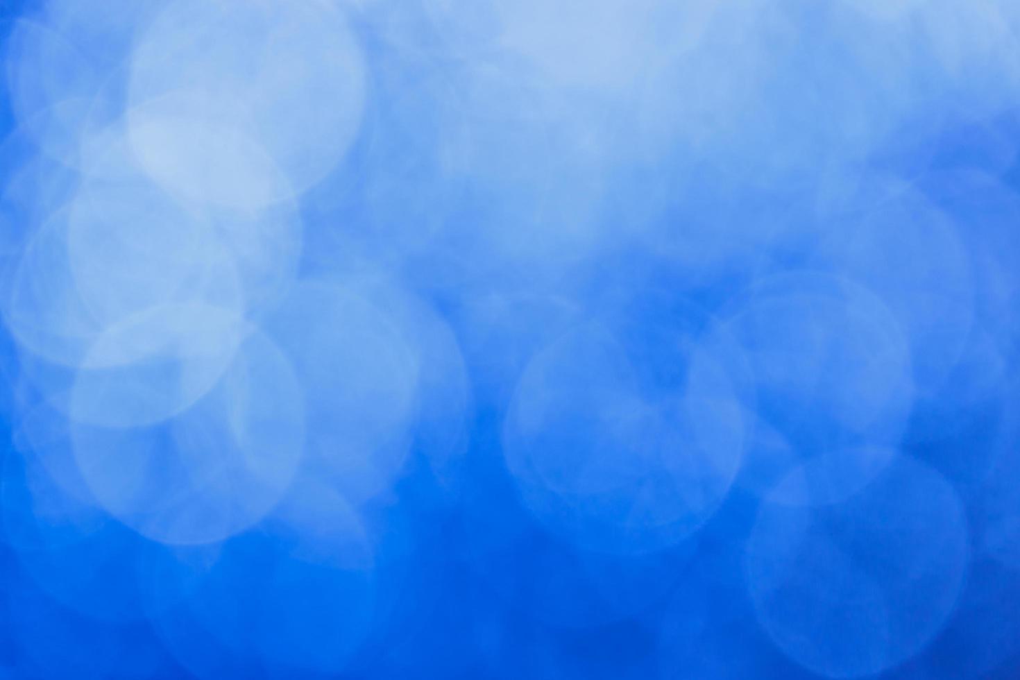 Blue abstract blurry background with highlights photo