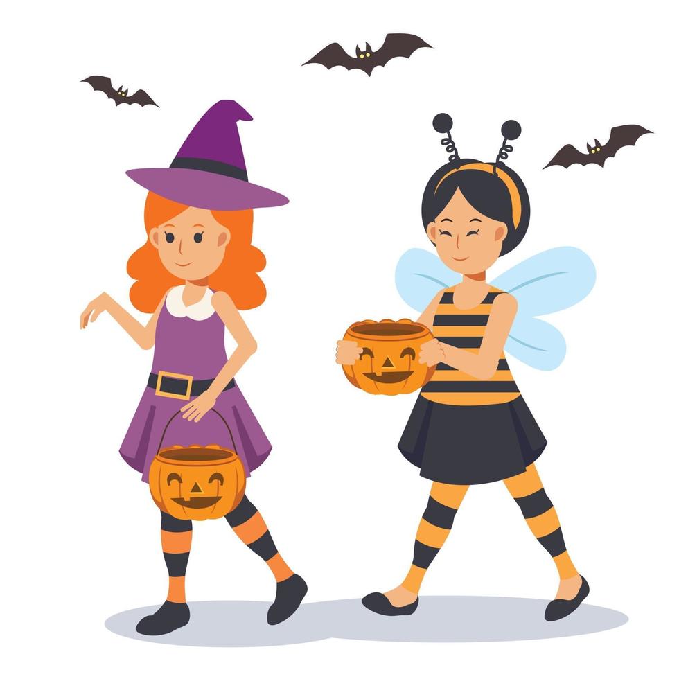 2 niñas lindas en disfraz de halloween vector