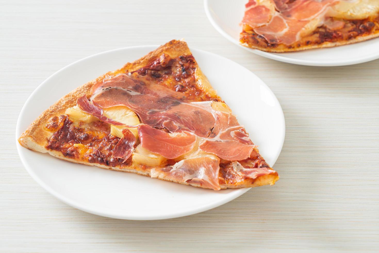 Pizza with prosciutto or parma ham pizza photo