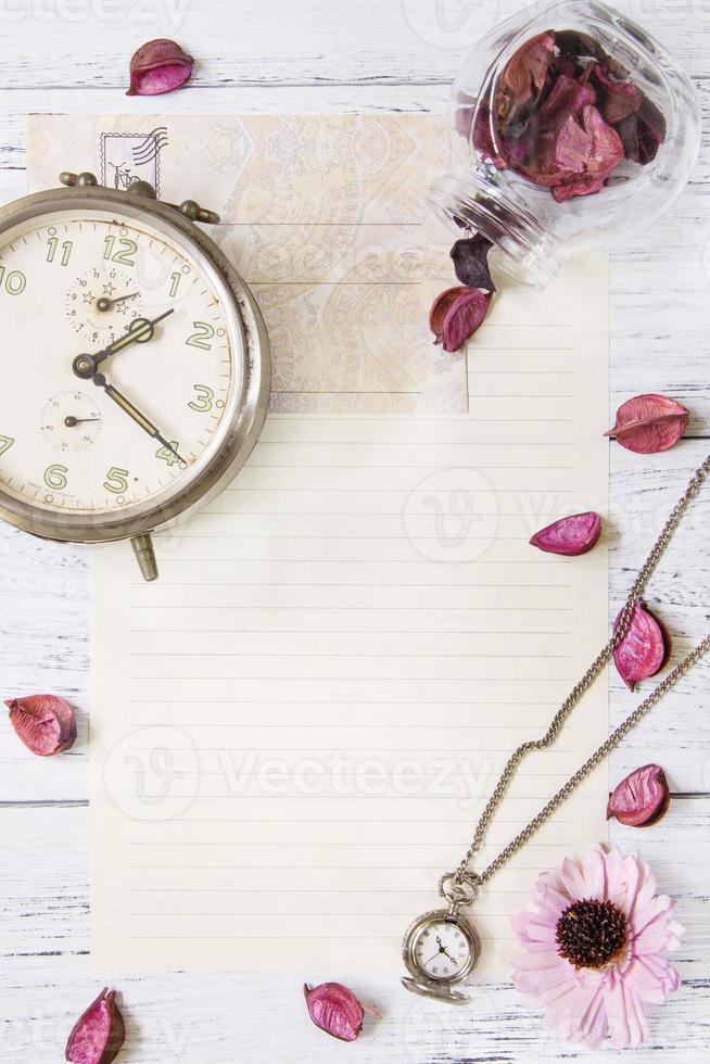 flower petals letter envelope glass bottle pocket clock photo