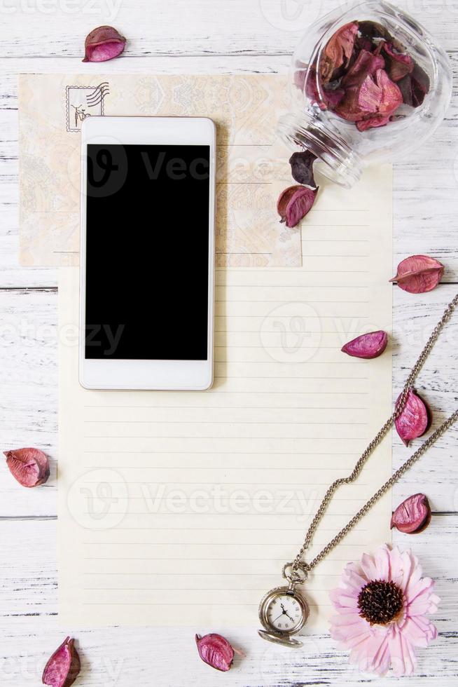 Petals letter envelope glass bottle smart phone mock up pocket clock photo