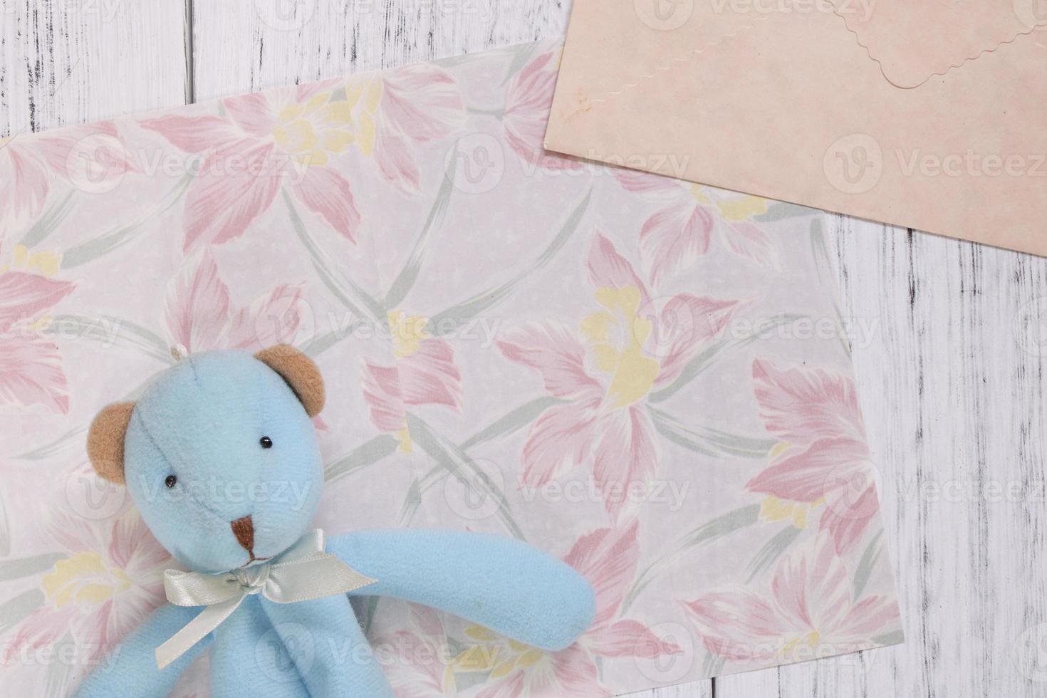 Floral paper with toy photo