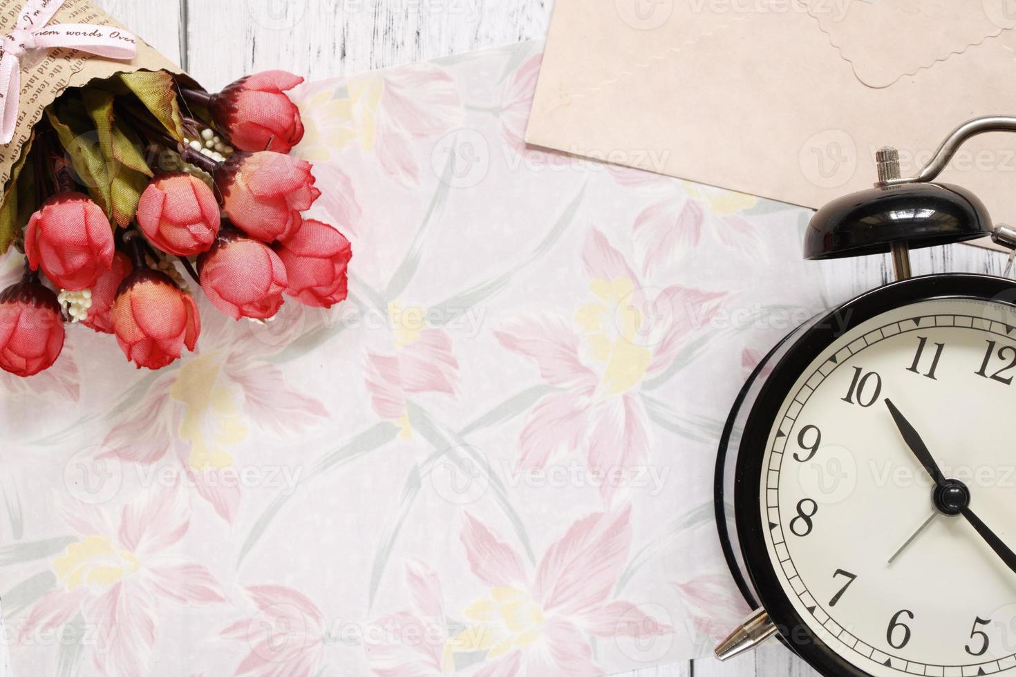 Floral paper with flowers and clock photo