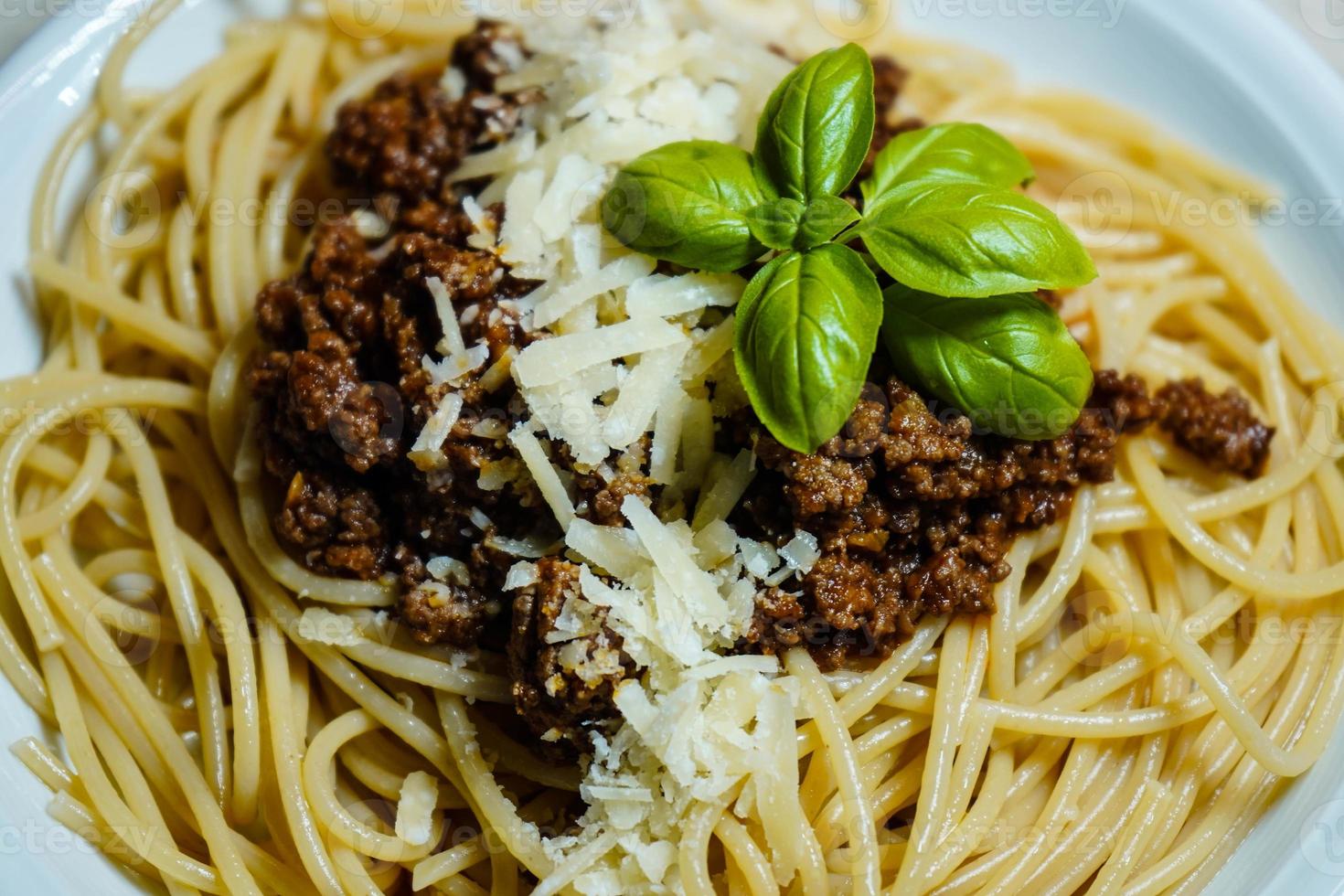 Spaghetti bolognese with tomato sauce photo