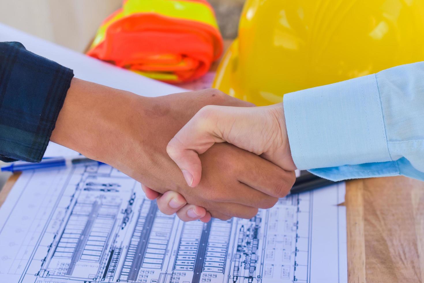 Shake hand teamwork hand shake agreement in meeting team Engineer photo
