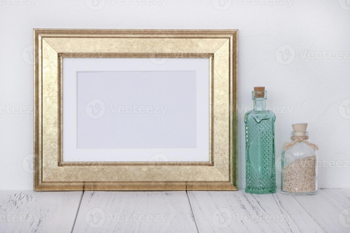 Gold frame with bottle photo