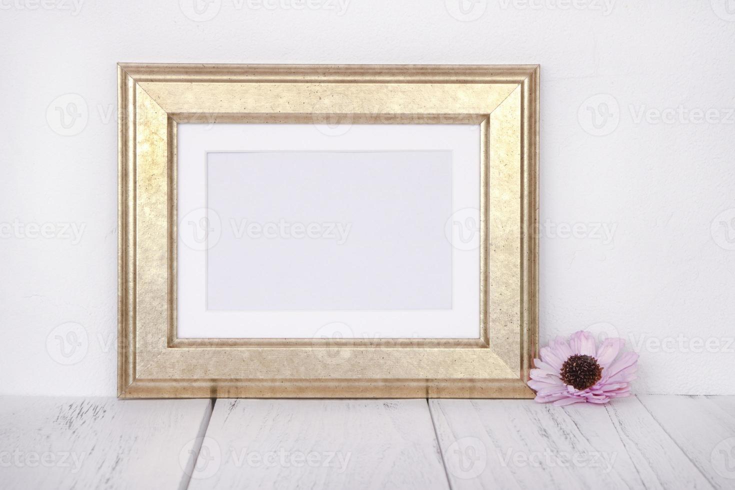 Golden frame with flower photo