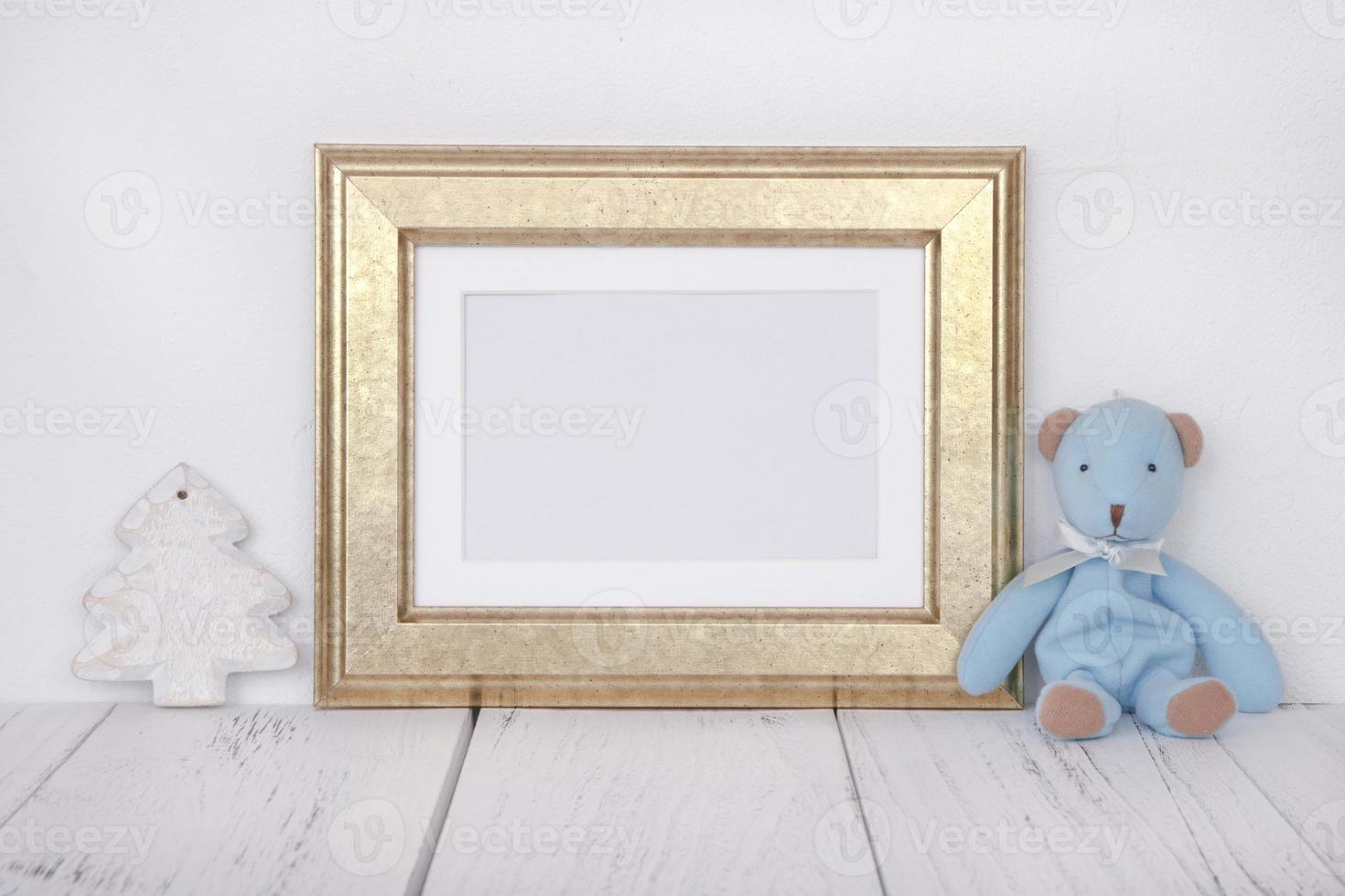 Gold frame with bear and tree photo