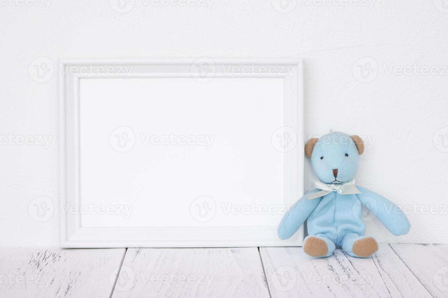 White frame with bear photo