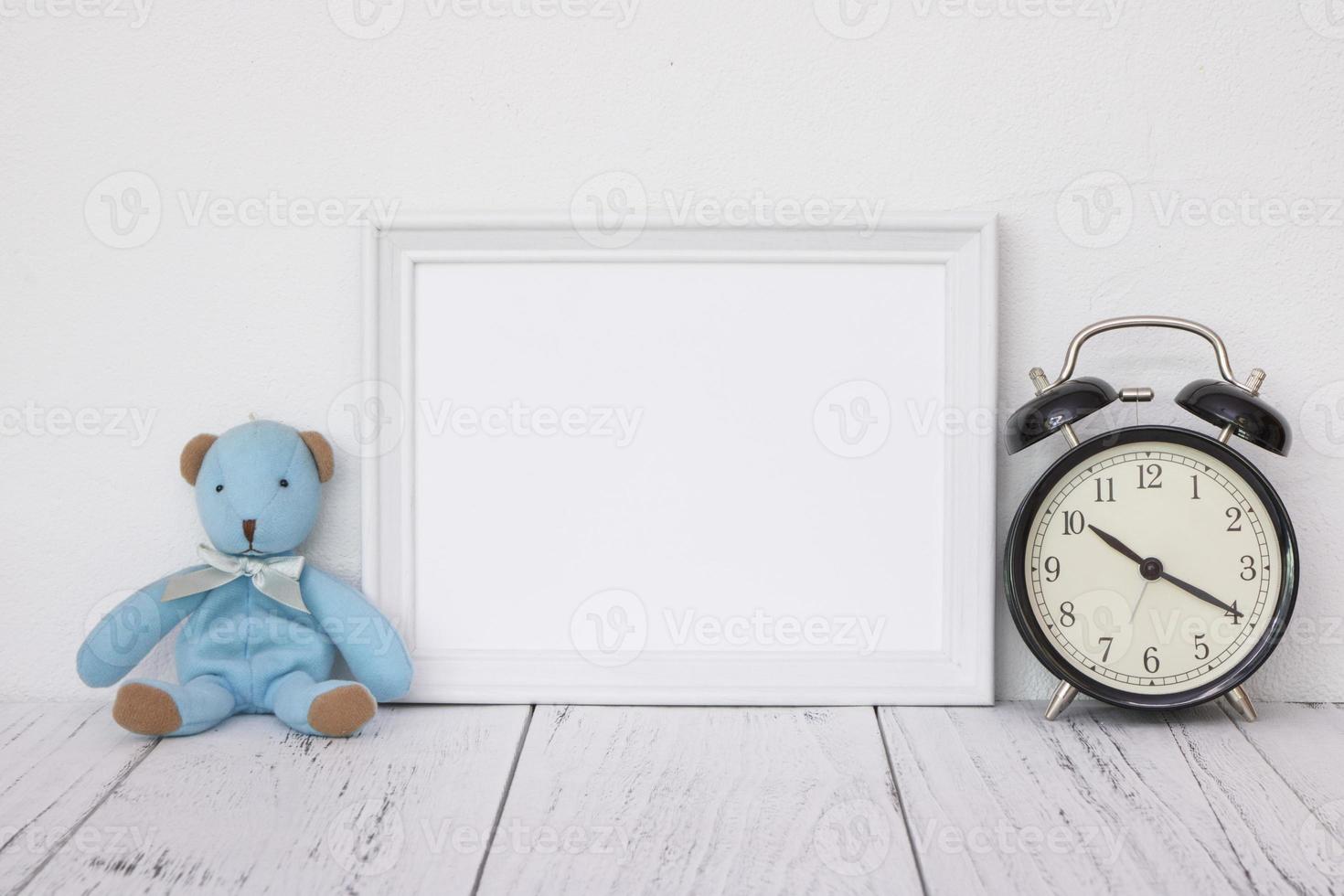 White frame with bear and clock photo