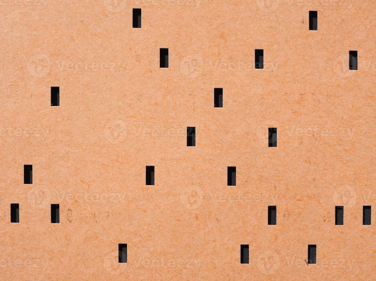 Orange punched card for programming photo