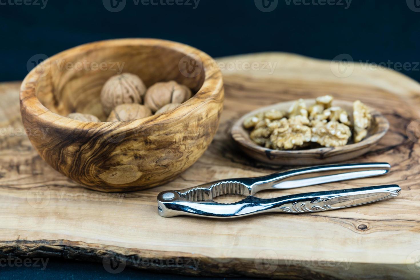 Fresh walnut going to be cracked photo