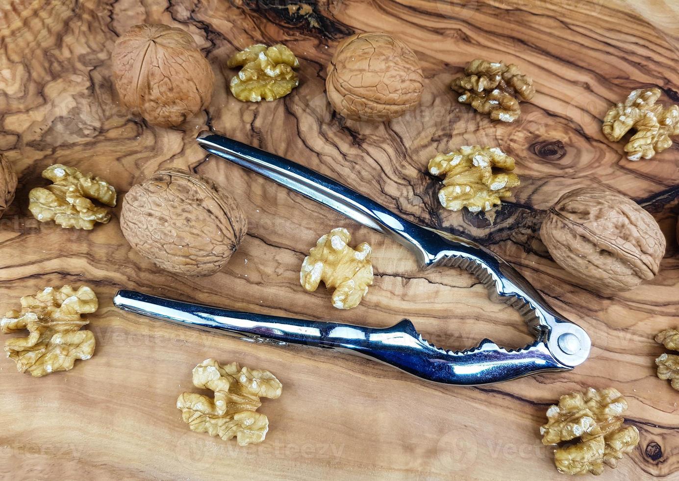 Fresh walnut going to be cracked photo
