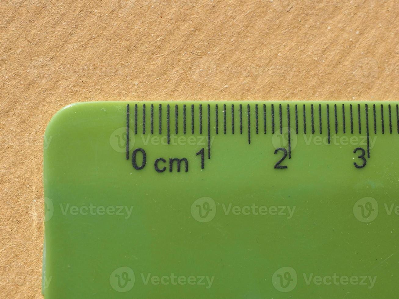 Green plastic metric ruler photo
