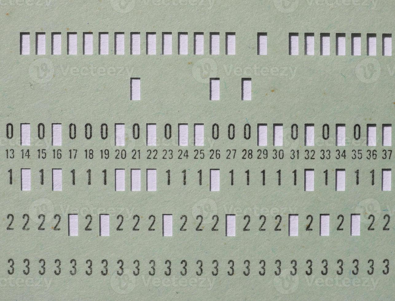 Green punched card for programming photo