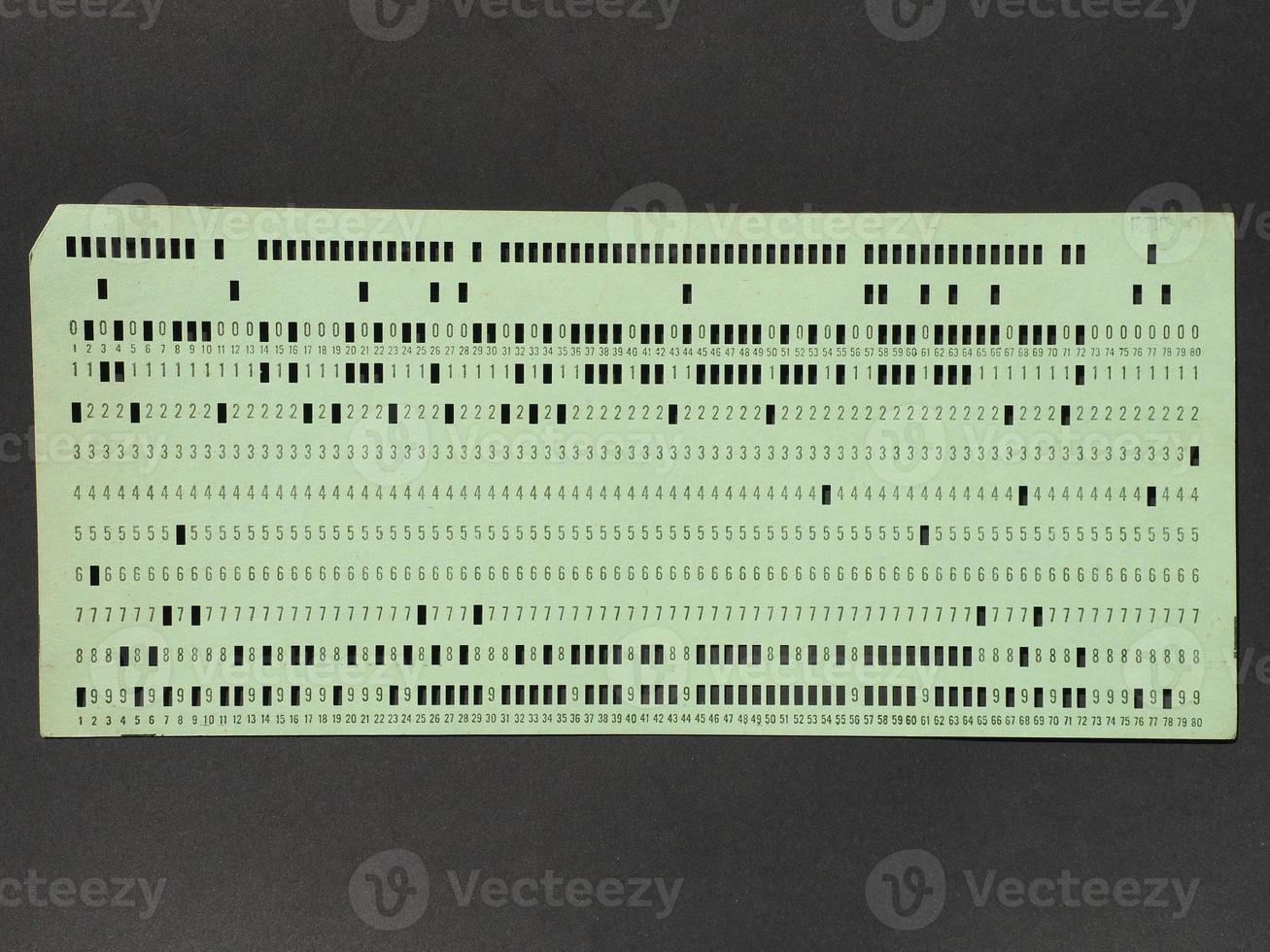 Green punched card for programming photo