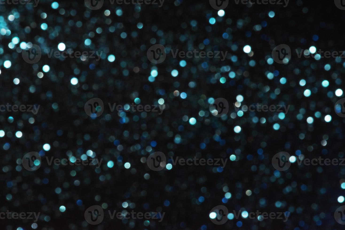 Defocus light navy blue glitter. Abstract light background photo