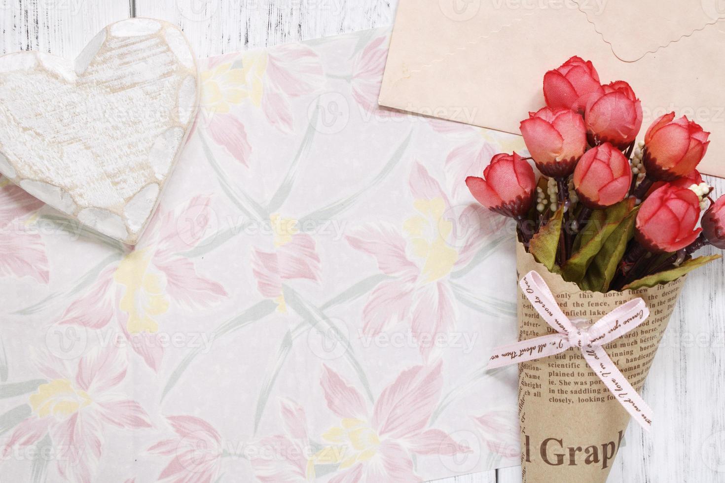 Floral paper with heart and flowers photo