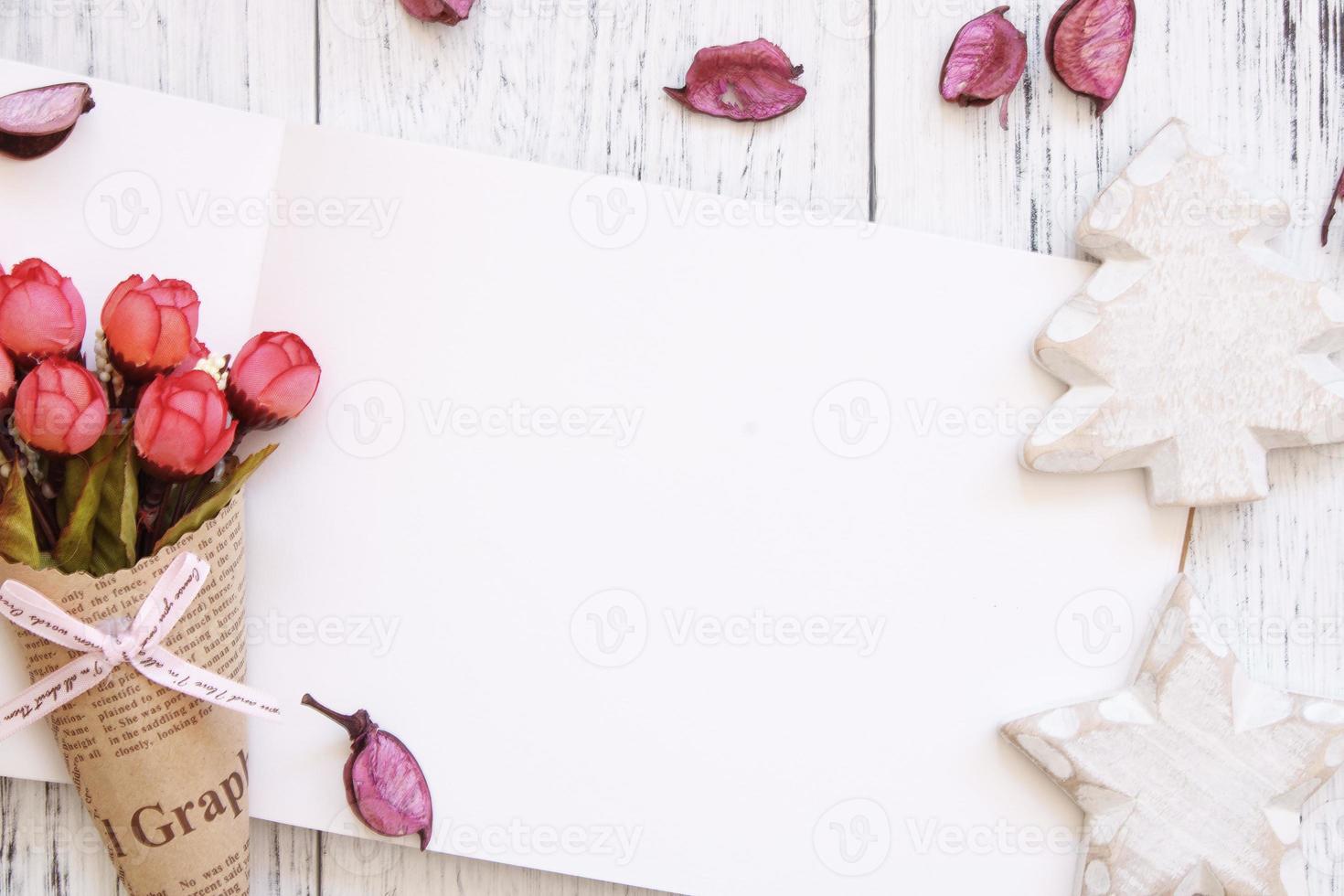 Paper with flowers and ornaments photo