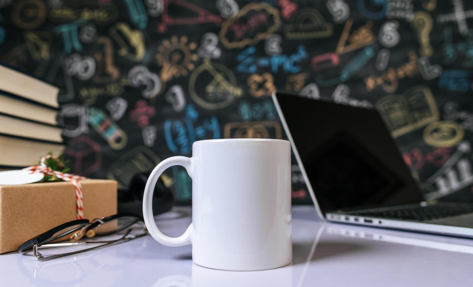 the cup on the table in the classroom. photo