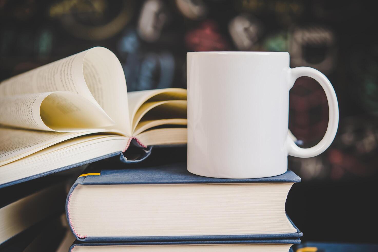 cup on the books in classroom photo