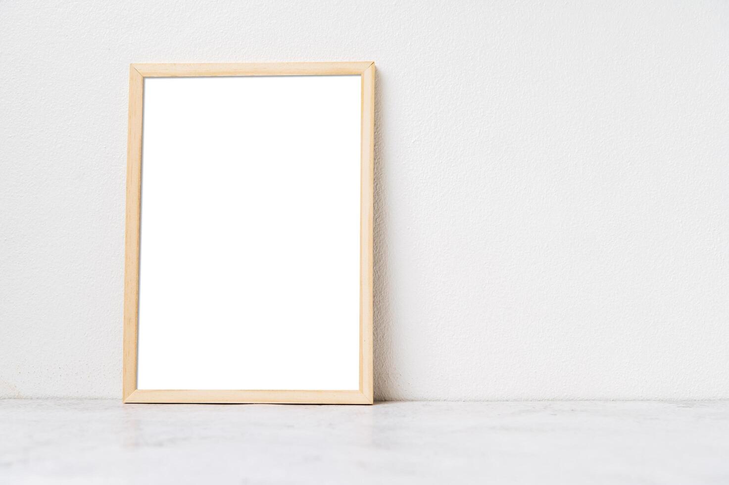 A picture frame placed on a white background photo