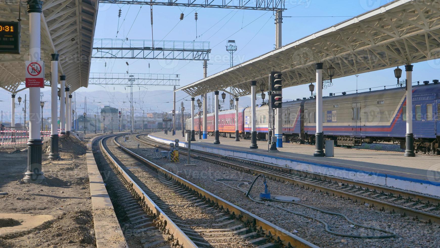 Trans Siberian railway track platform landscape view in Russia photo