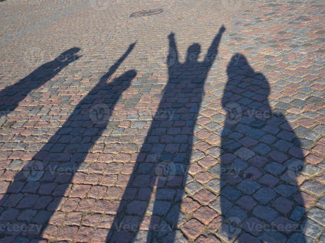 4 People silhouette shadow of cheering playing photo