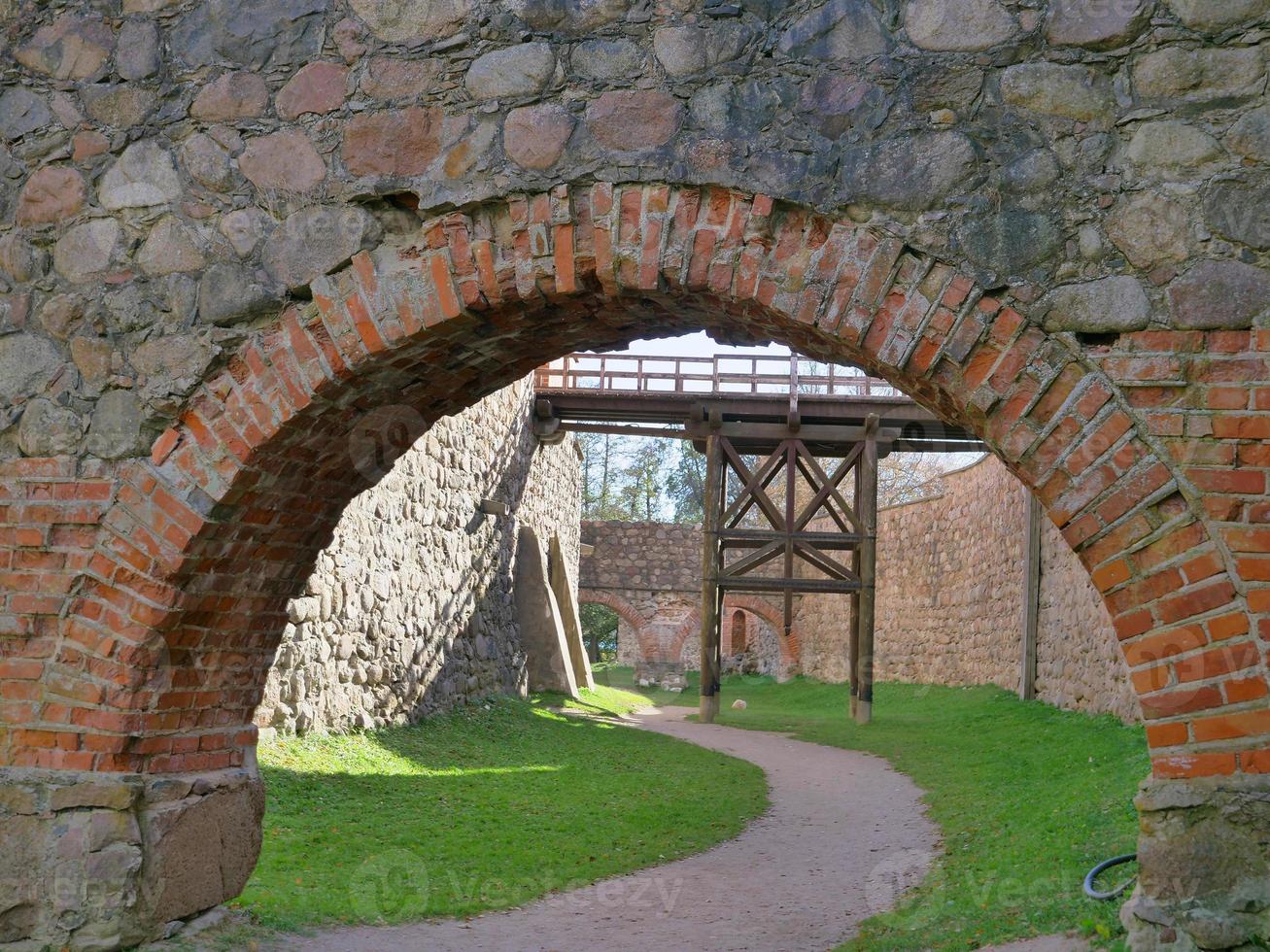 Retro vintage stone brick wall in Trakai castle Lithuania photo
