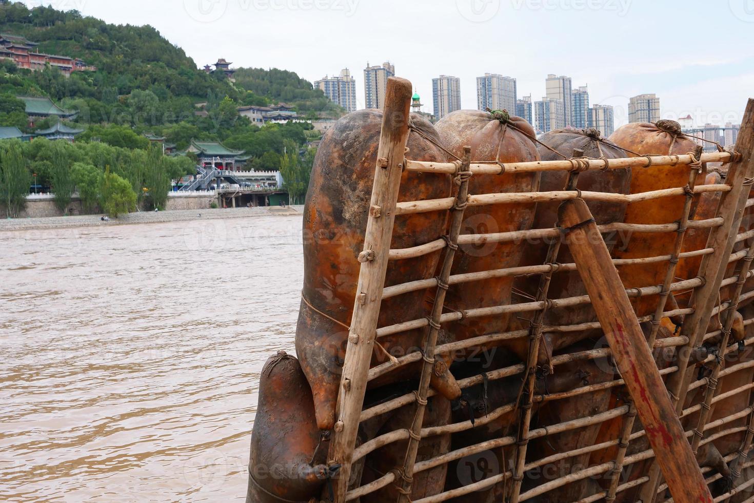 Sheepskin raft by the Yellow River in Lanzhou Gansu China photo