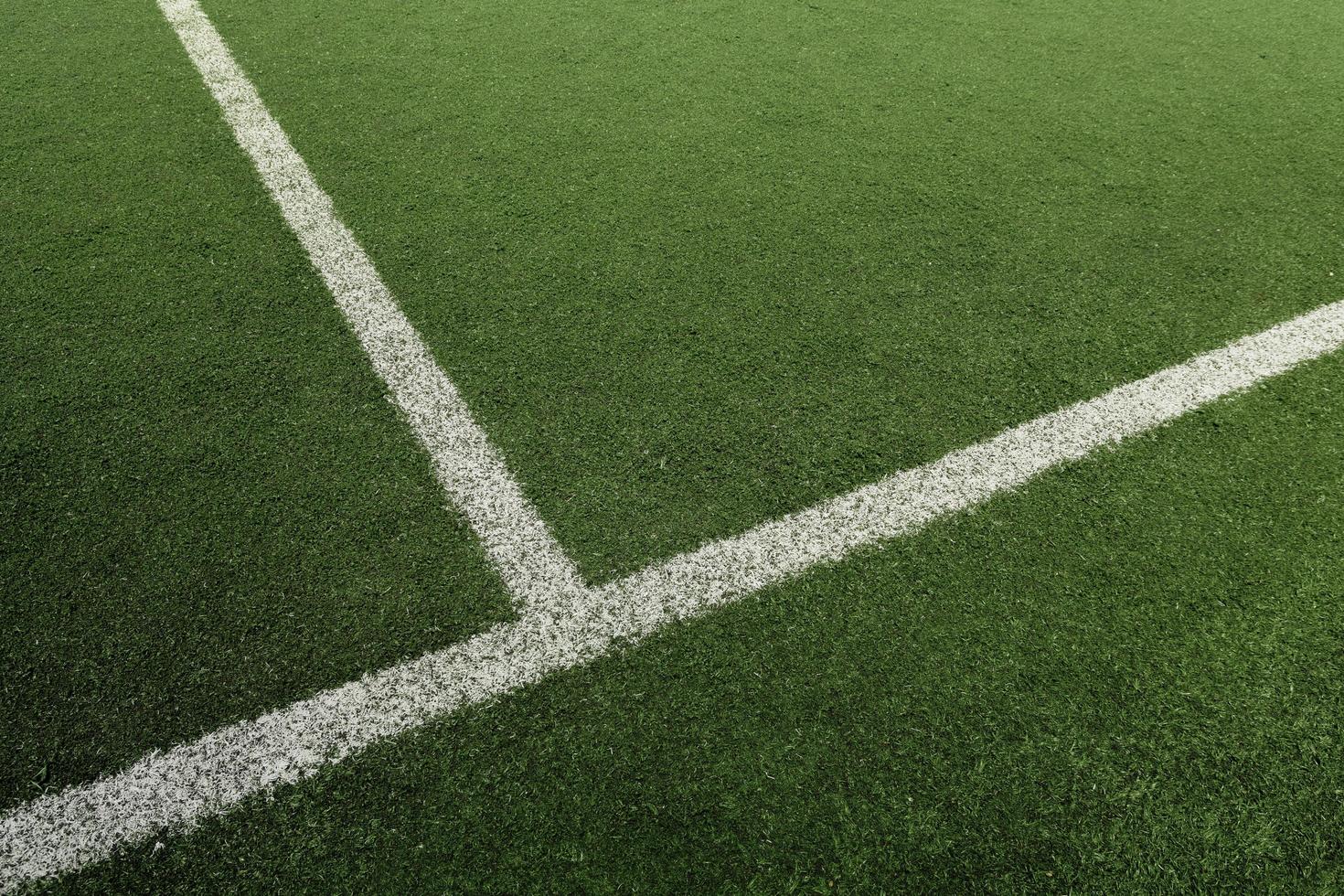 Soccer or football field with white line photo