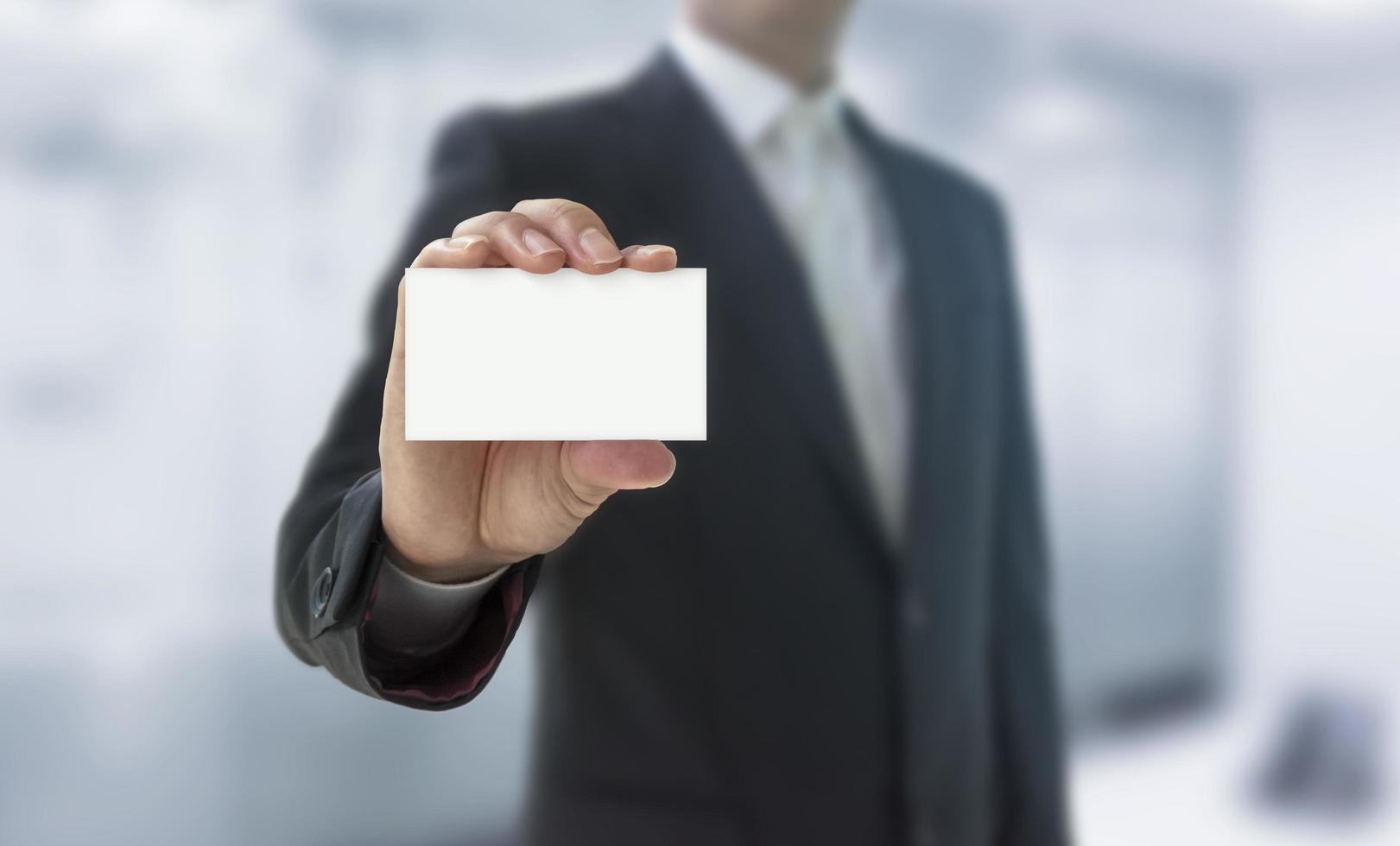 Man showing a business card photo