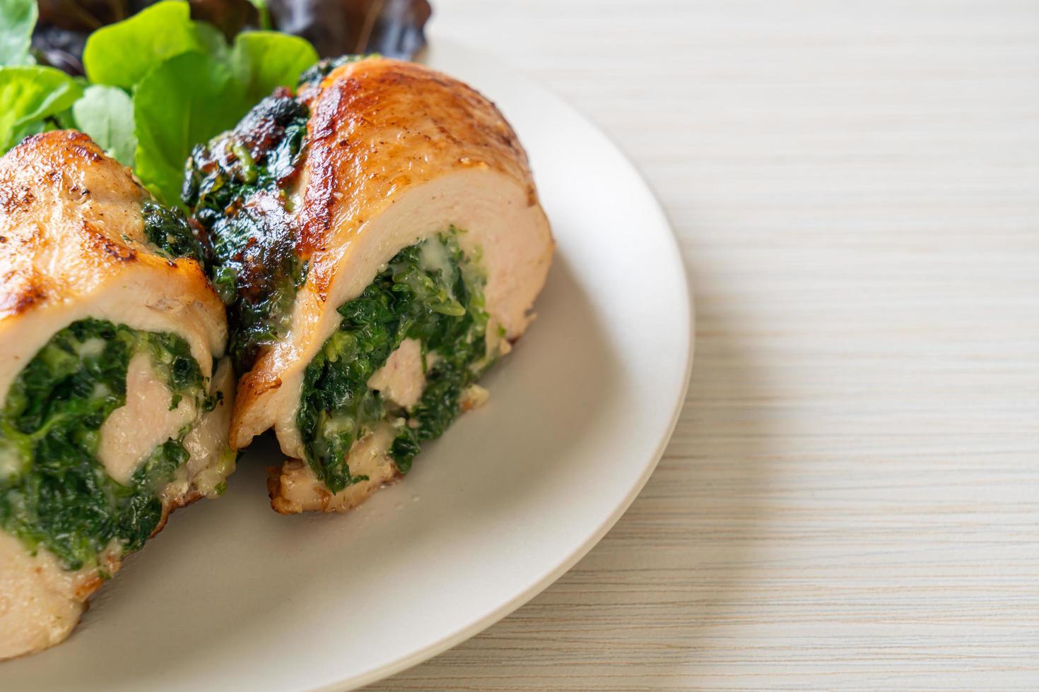 Chicken breast stuffed with cheese and spinach photo