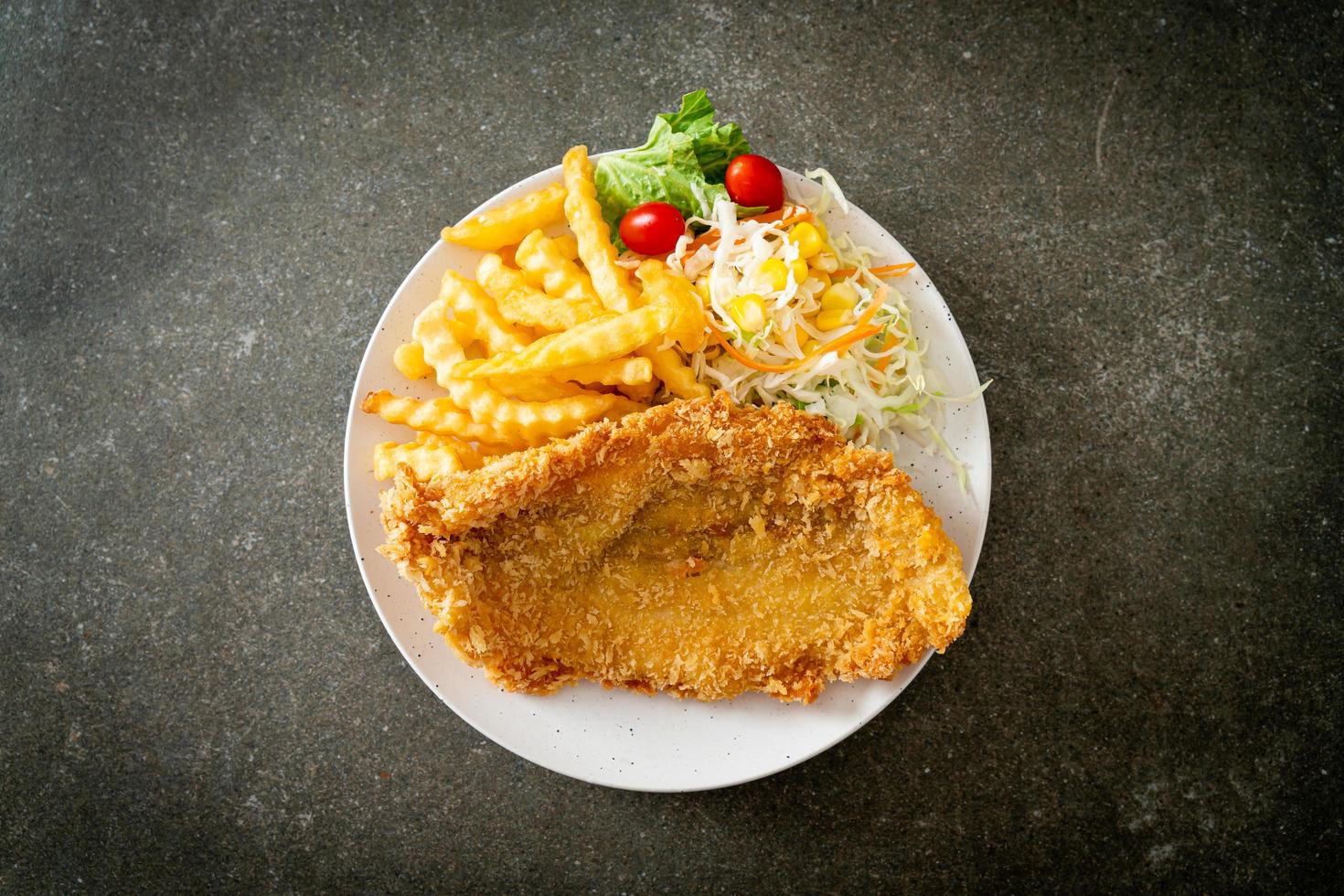 Fried fish and potatoes chips photo